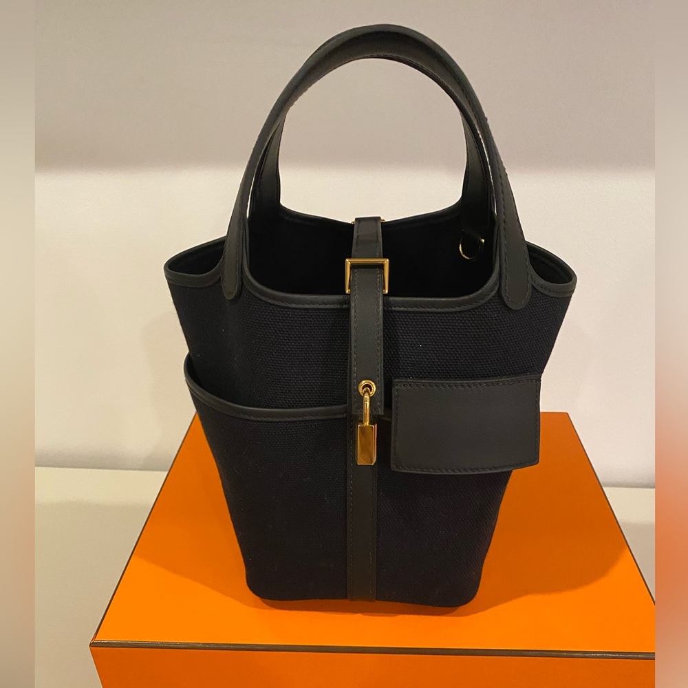 HERMES cargo black picotin 18 with gold hardware worn once in pristine condition